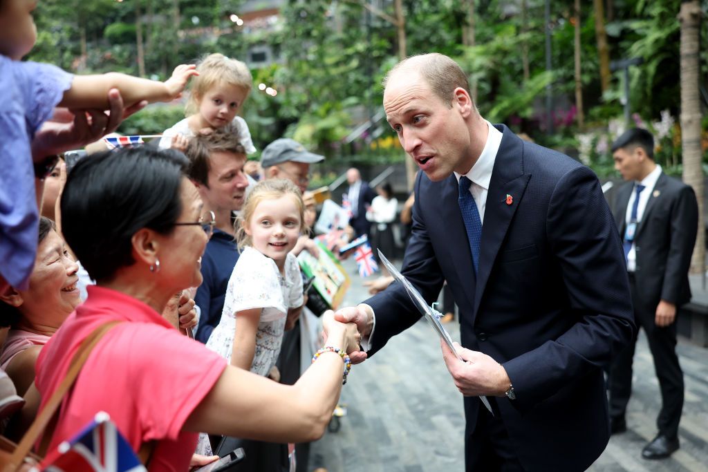 SINGAPORE, SINGAPORE - NOVEMBER 05: Prince William, Prince of Wales greets members of the public during his visit to the HSBC Rain Vortex at Jewel Changi Airport on day one of his visit to Singapore on November 05, 2023 in Singapore. The Prince of Wales is visiting Singapore to attend the Earthshot Prize Awards and will also carry out several engagements related to environmental issues. (Photo by Chris Jackson/Getty Images)