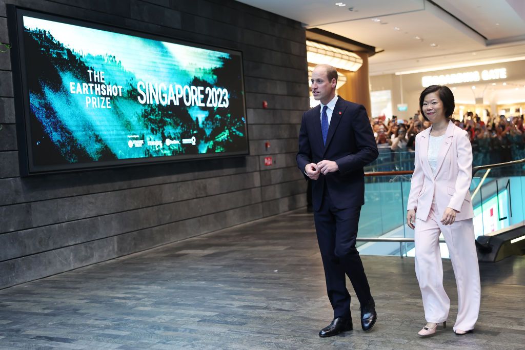 SINGAPORE, SINGAPORE - NOVEMBER 05: Prince William, Prince of Wales and Sim Ann, Senior Minister of State for Foreign Affairs and Senior Minister of State for National Development greet members of the public during his visit to Jewel Changi Airport on day one of his visit to Singapore on November 05, 2023 in Singapore. The Prince of Wales is visiting Singapore to attend the Earthshot Prize Awards and will also carry out several engagements related to environmental issues. (Photo by Chris Jackson/Getty Image