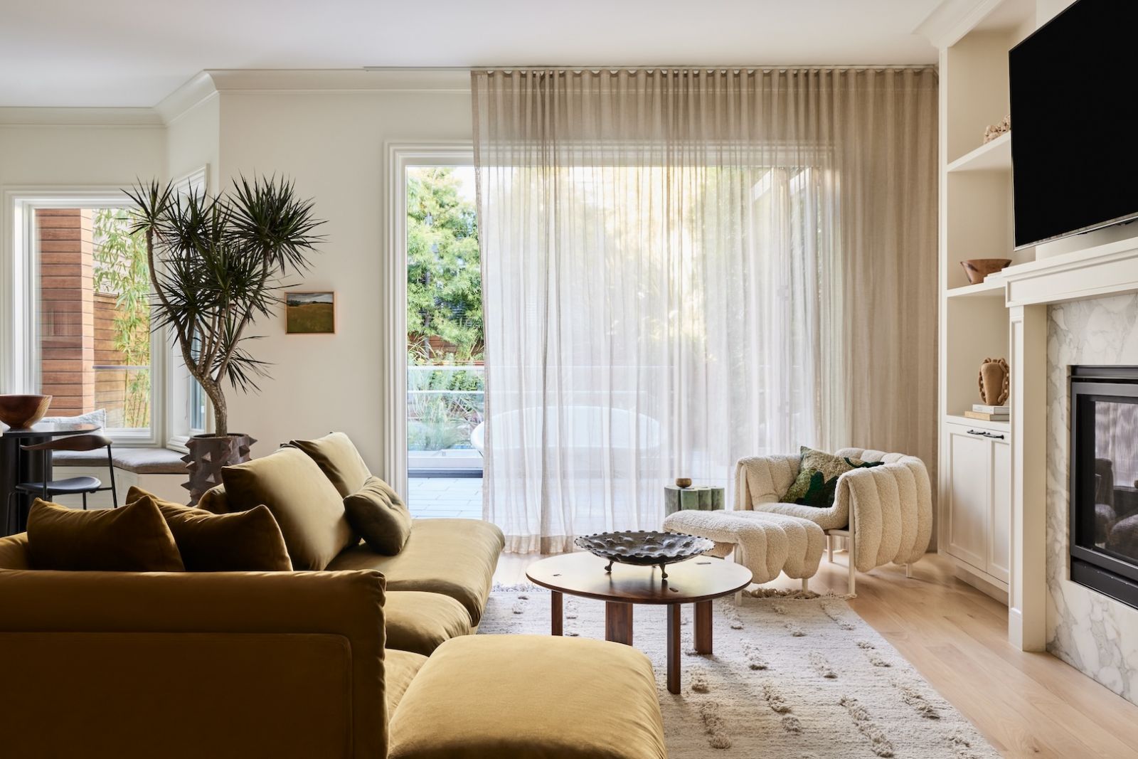 Spot the playful pieces and elements peeking out in this family room