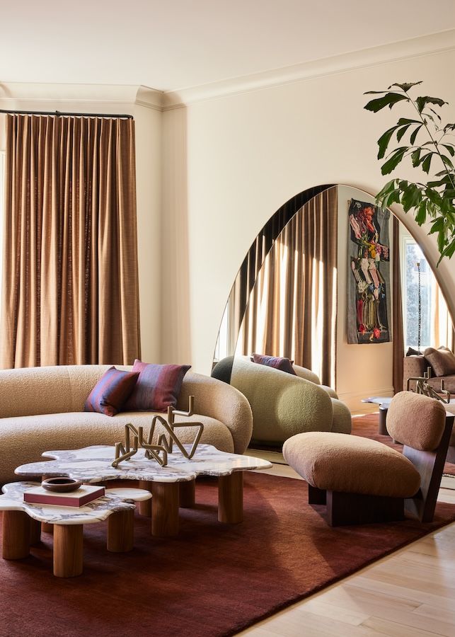 The mirror works to enhance the living room space