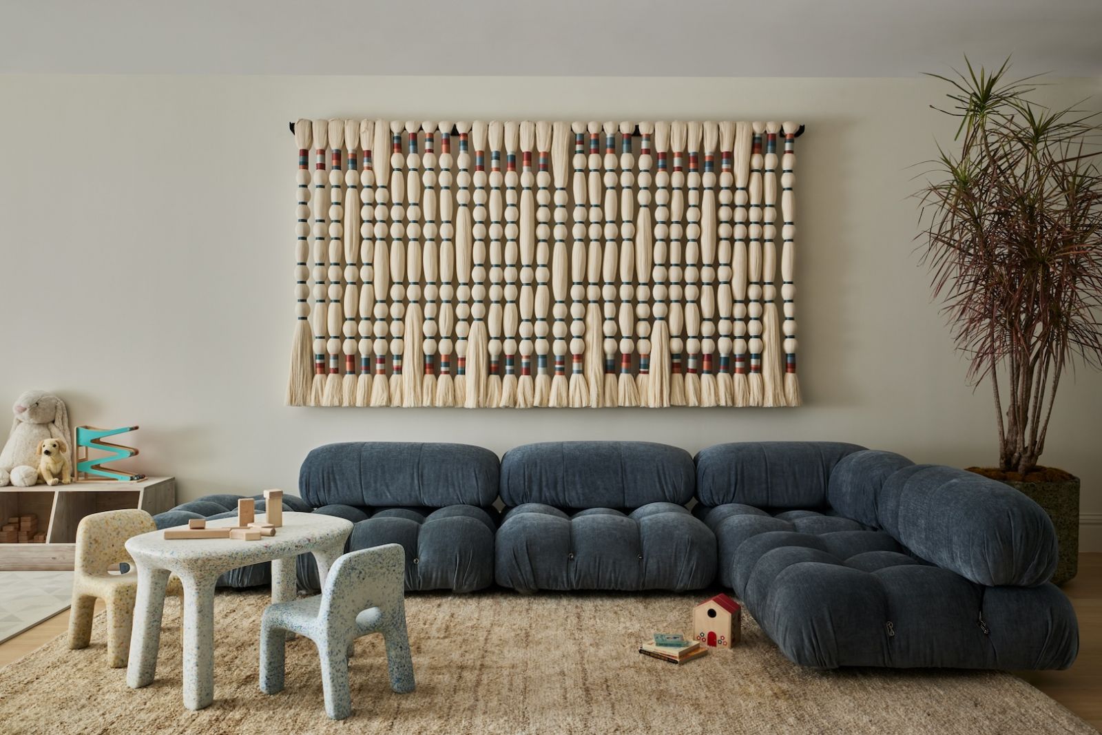 Softer pieces and furniture grace the playroom