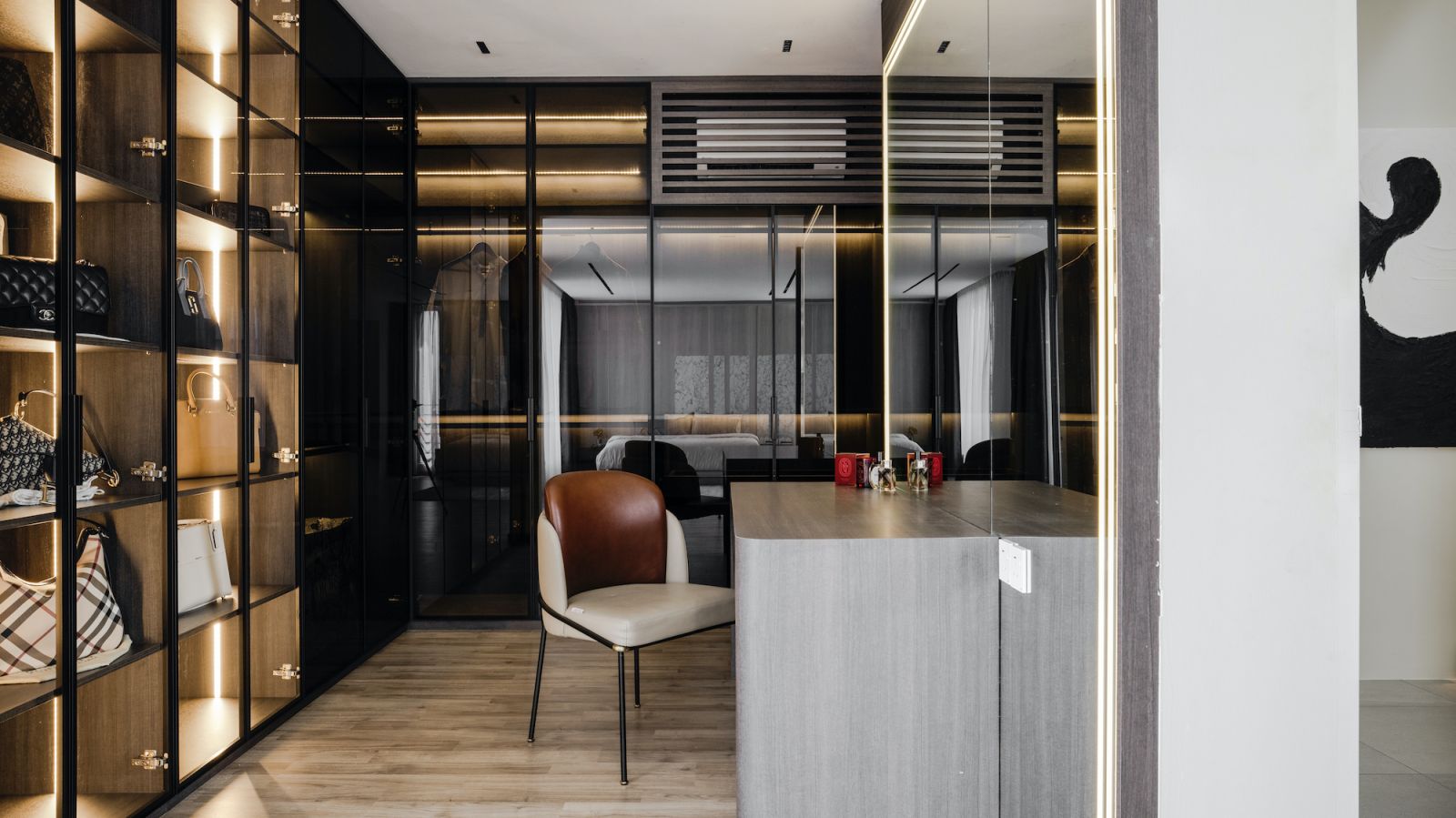 A seating area for the walk-in wardrobe