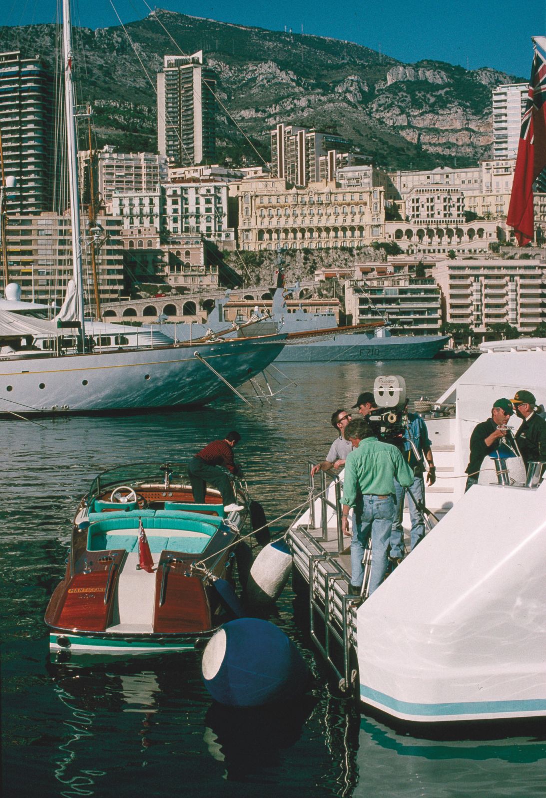After boarding a Riva Aquarama Special speedboat, Bond steals aboard the Manticore to find the admiral dead