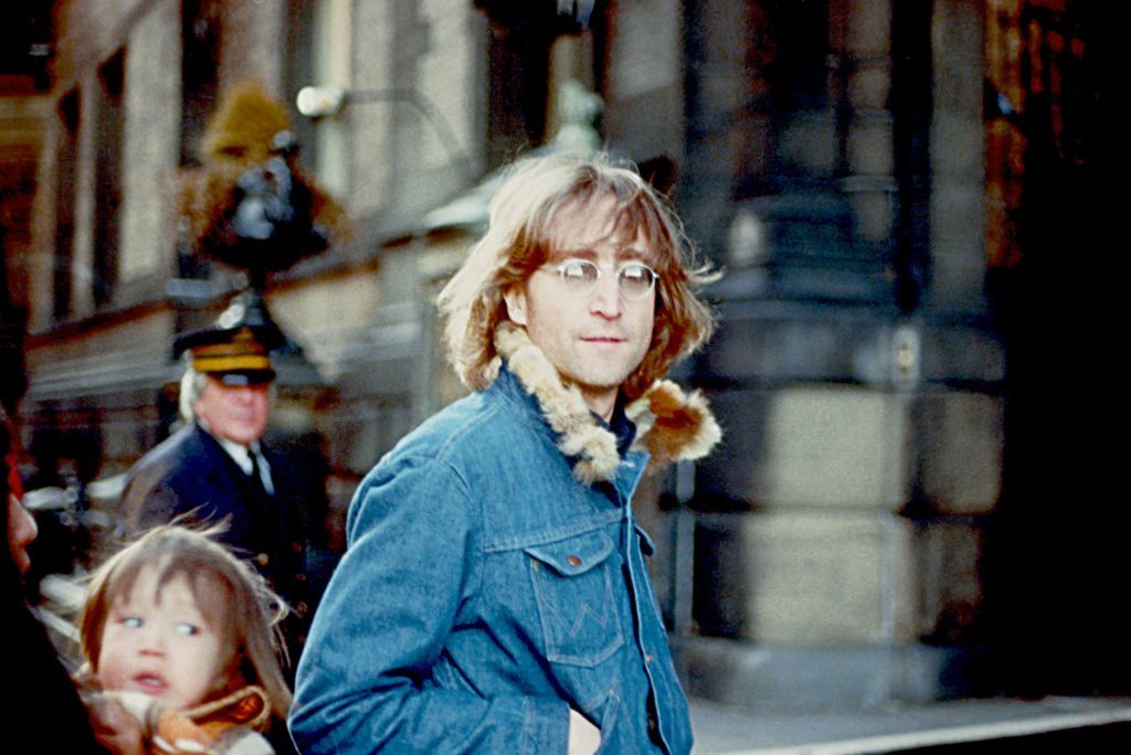 NEW YORK - 1977: Former Beatle John Lennon poses for a photo with his wife Yoko Ono and son Sean Lennon in 1977 in New York City, New York.  (Photo by Vinnie Zuffante/Getty Images)
