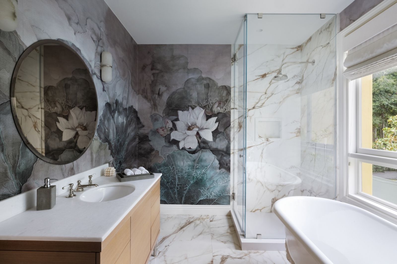 Gold accents and wooden hues provide a sense of elegance to this bathroom