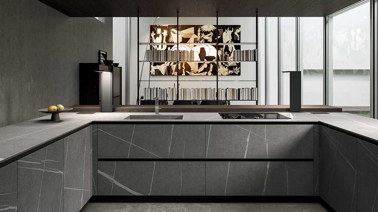 Highly modern and functional, a grey iteration of the Arrital AK_04 kitchen system