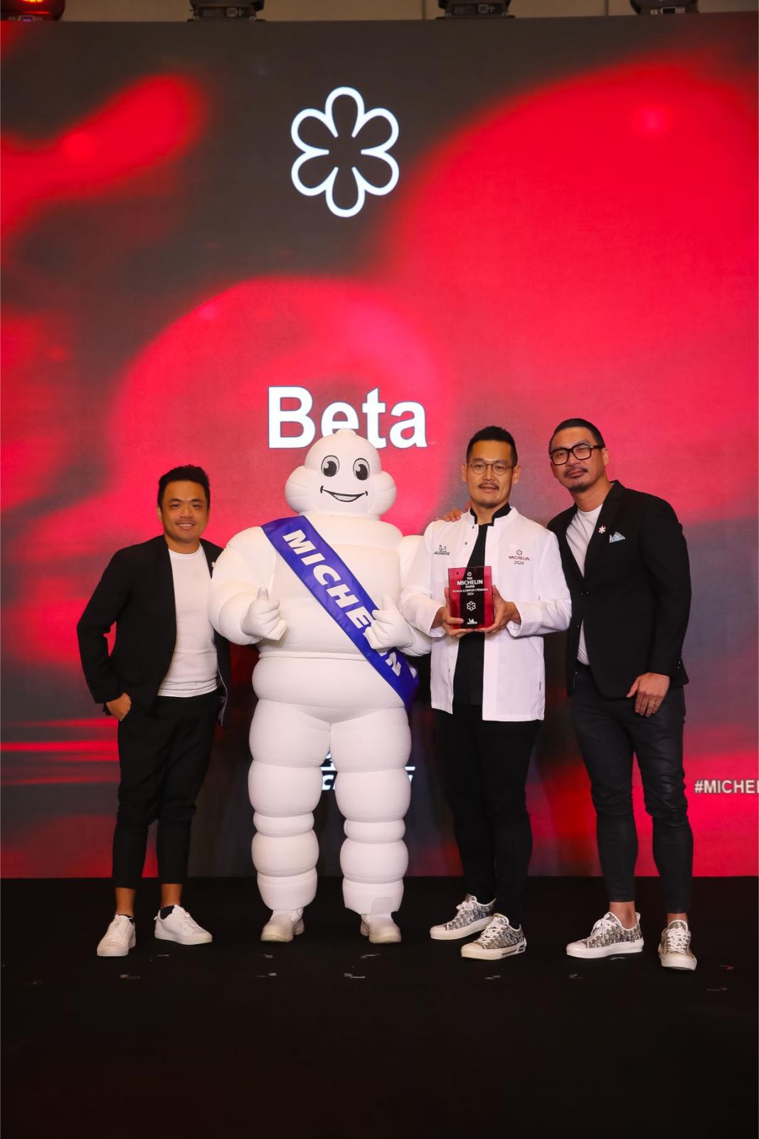Beta KL's Li Tat Tuan, Raymond Tham, and Kelvin Cheah receiving their new Michelin star