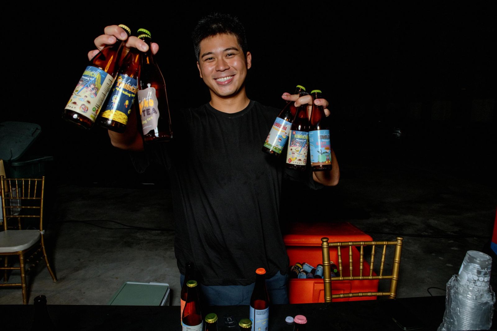 Jeff Lau with his Uncle Jeff Kombucha bottles