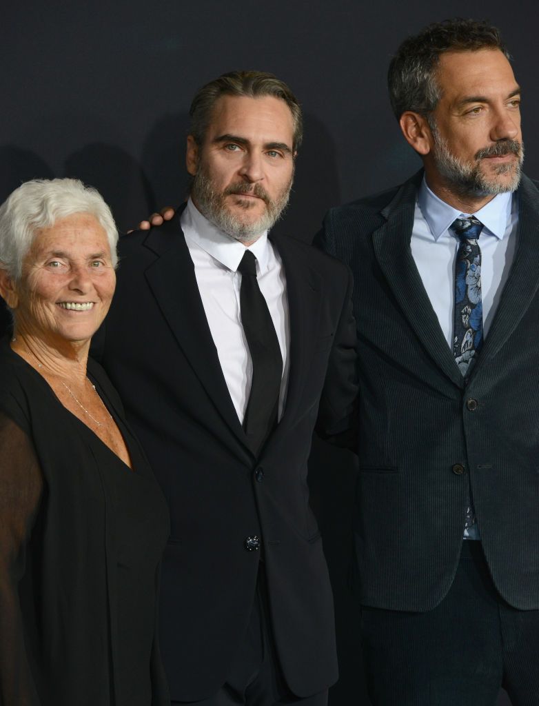 HOLLYWOOD, CA - SEPTEMBER 28: Joaquin Phoenix, mother Arlyn Phoenix and Todd Phillips arrive for the Premiere Of Warner Bros Pictures "Joker" held at TCL Chinese Theatre IMAX on September 28, 2019 in Hollywood, California. (Photo by Albert L. Ortega/Getty Images)