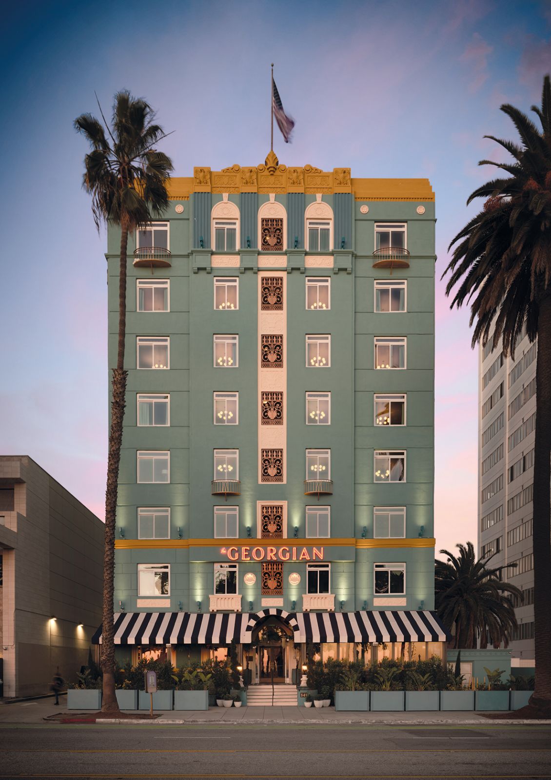 A view of The Georgian’s captivating turquoise-hued art deco facade at sunset (Photo: Fettle)