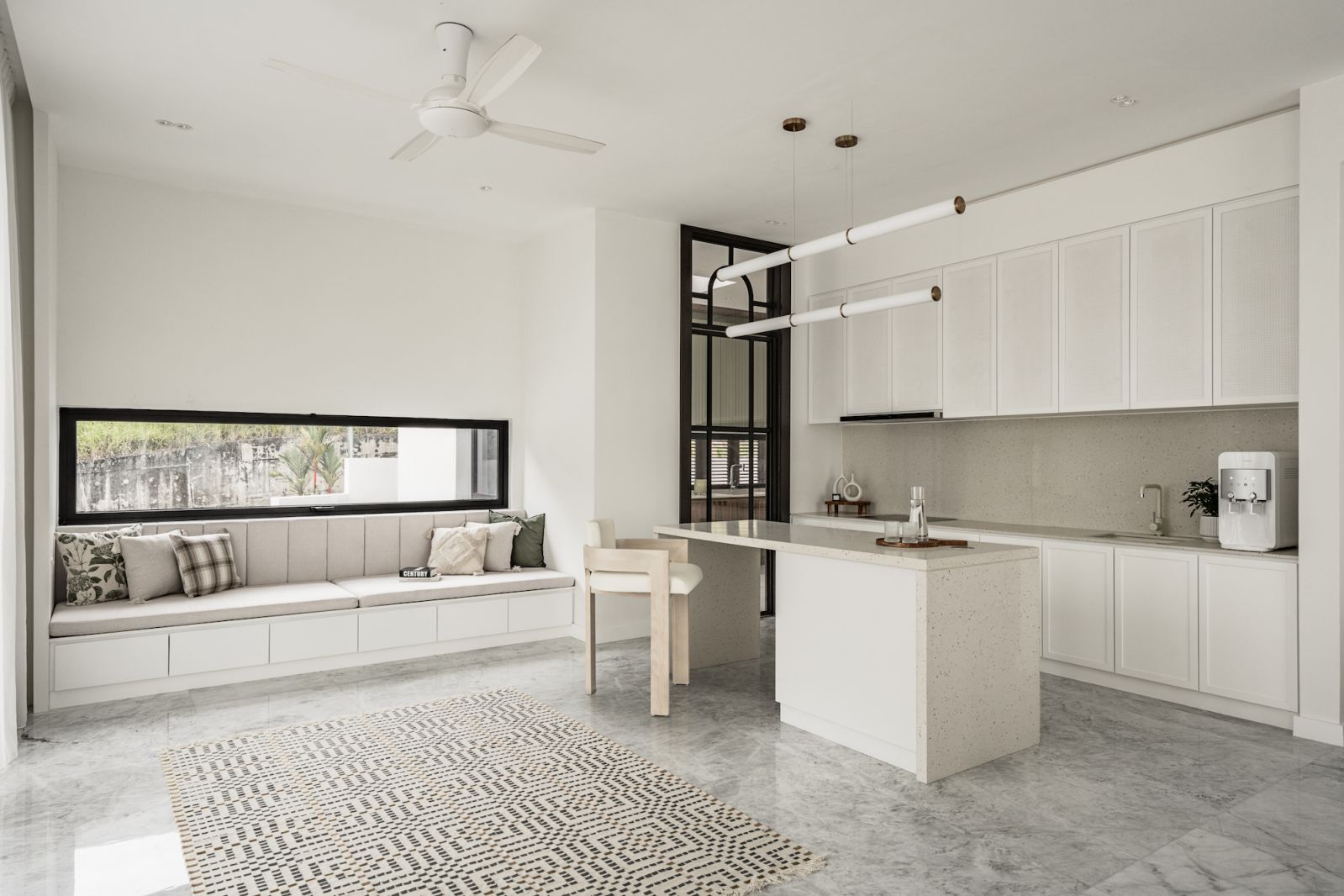 The slim window allows glimpses of the outdoors