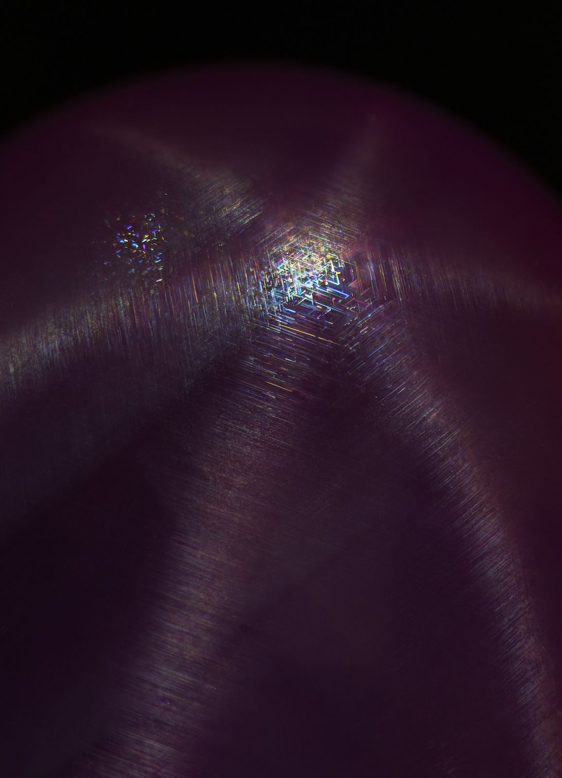 Microscopic rutile silk needles create a "star" effect in ruby. Photo: E. Billie Hughes/Lotus Gemology