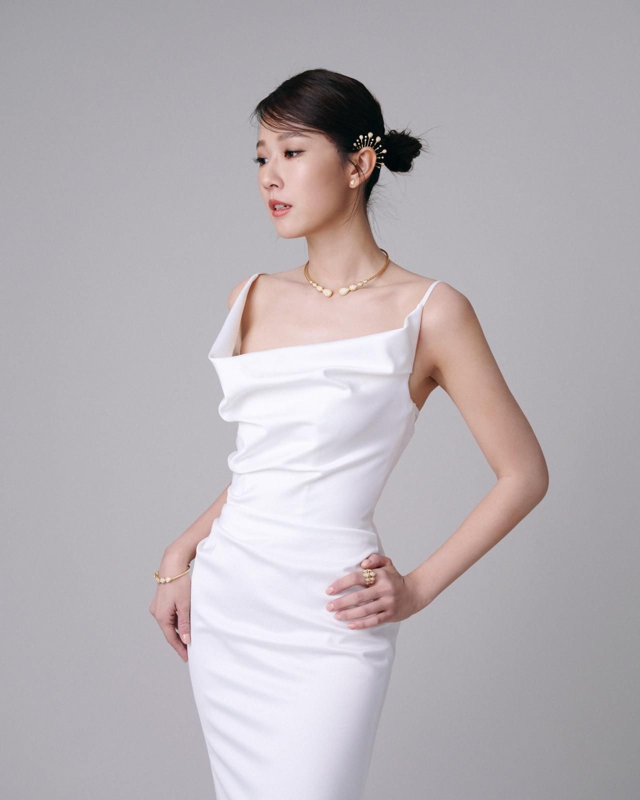方志友穿著白色禮服在典禮中上台領獎。(Photo: Boucheron)