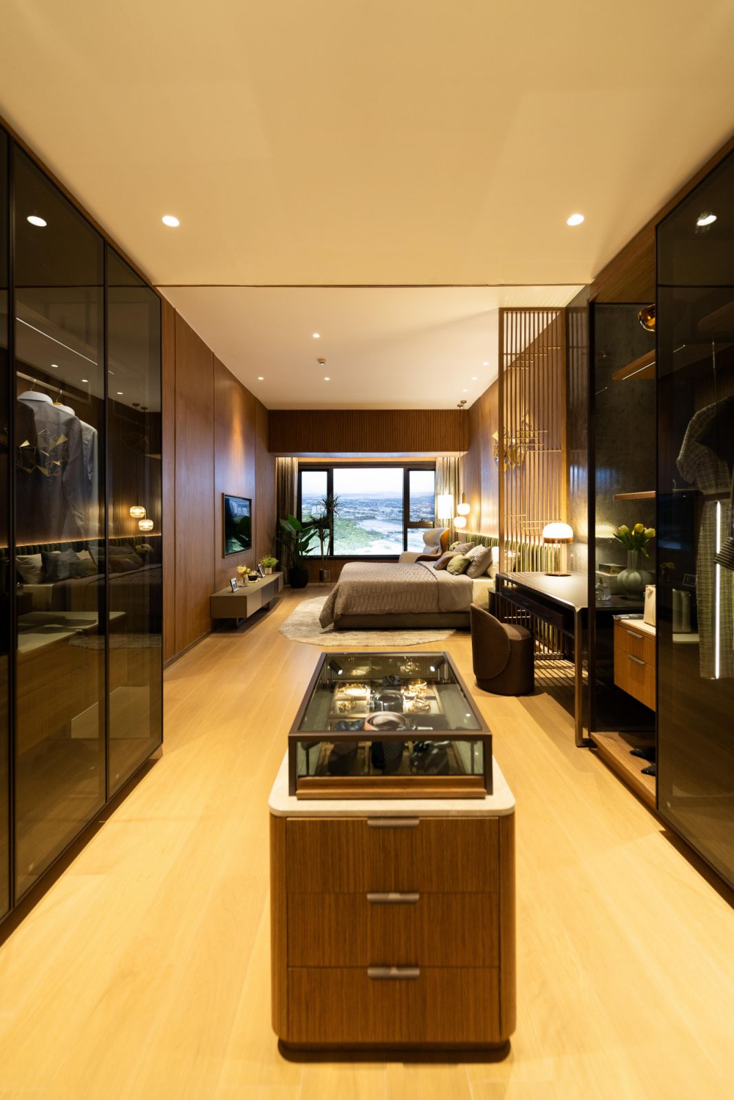 Warm tones make for a cosy space within The Velaris Residences North Tower's expansive four-bedroom unit