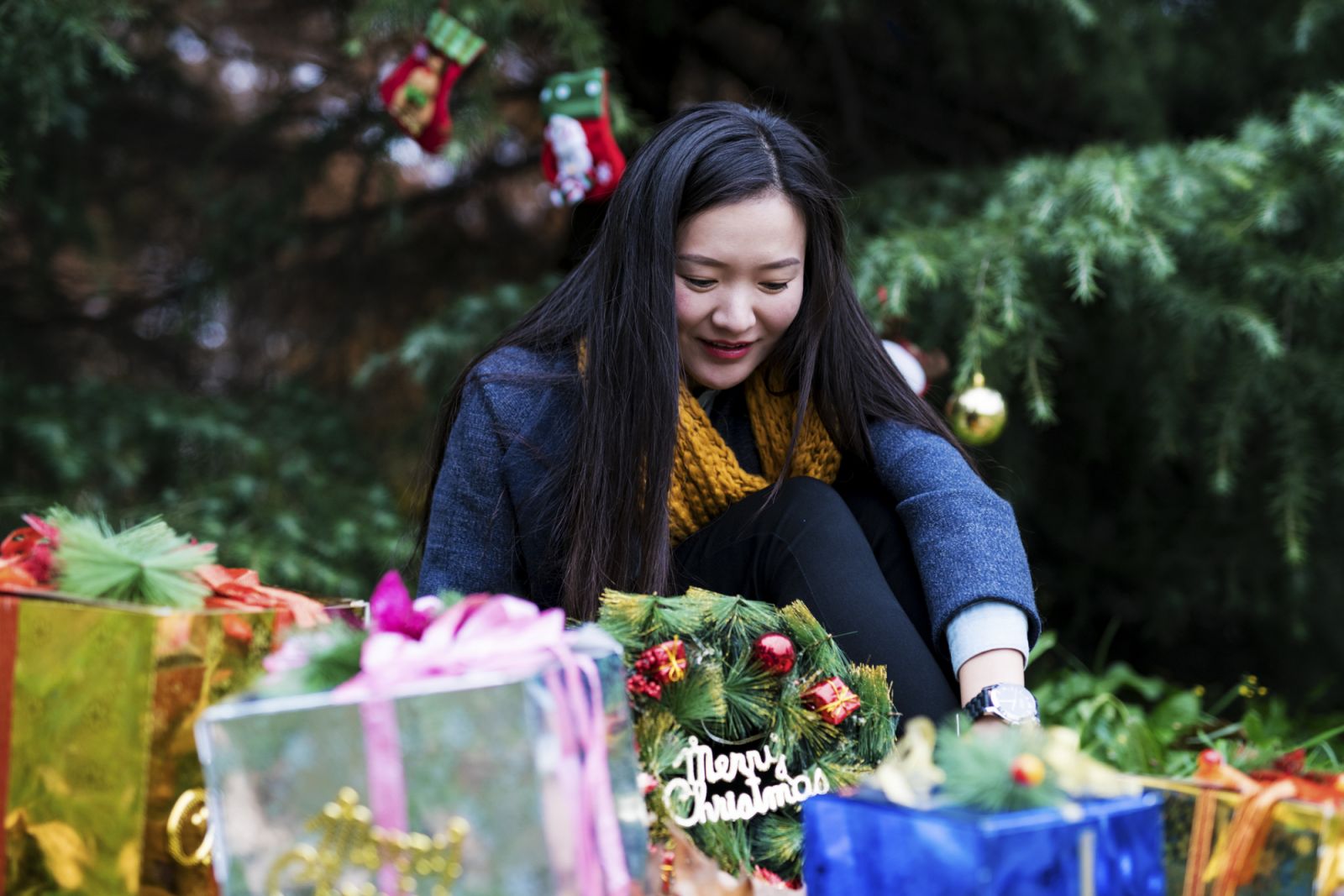 Happy woman with Christmas present.