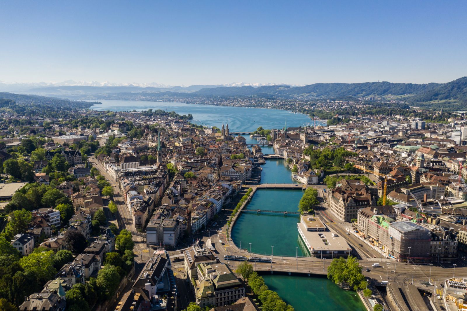 Aerial view of the famous Zurich old town around the Limmat river with lake Zurich in the background in Switzerland largest city