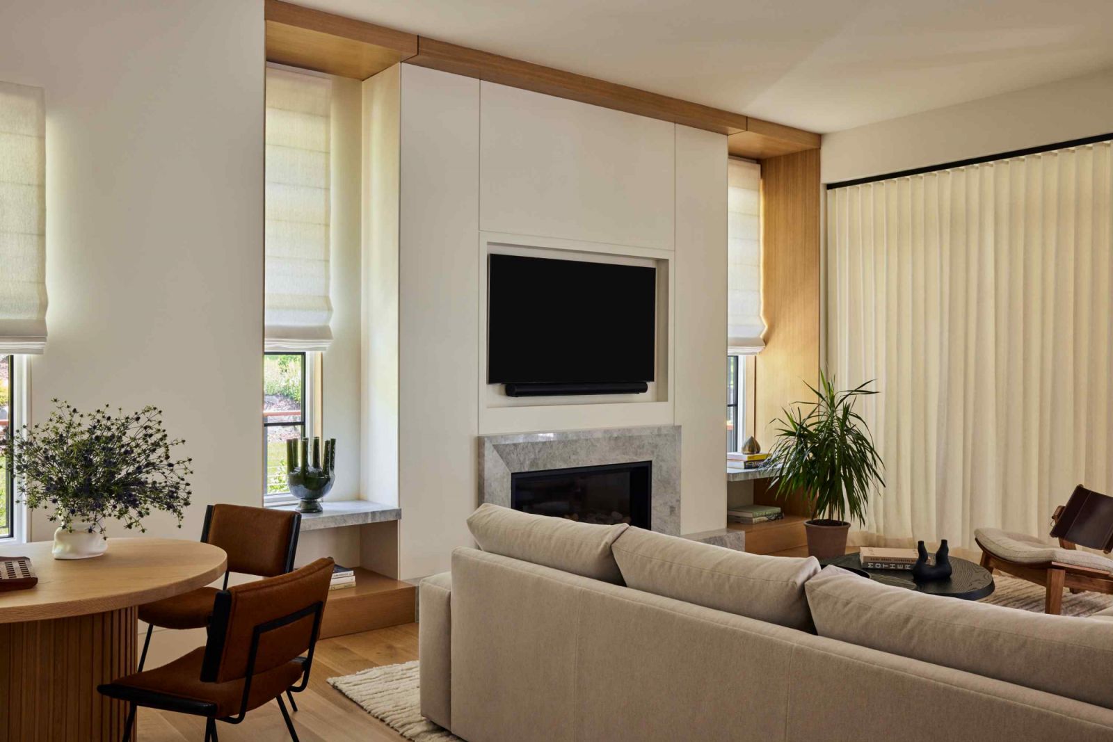 Edged fireplace and custom sectional in the family room