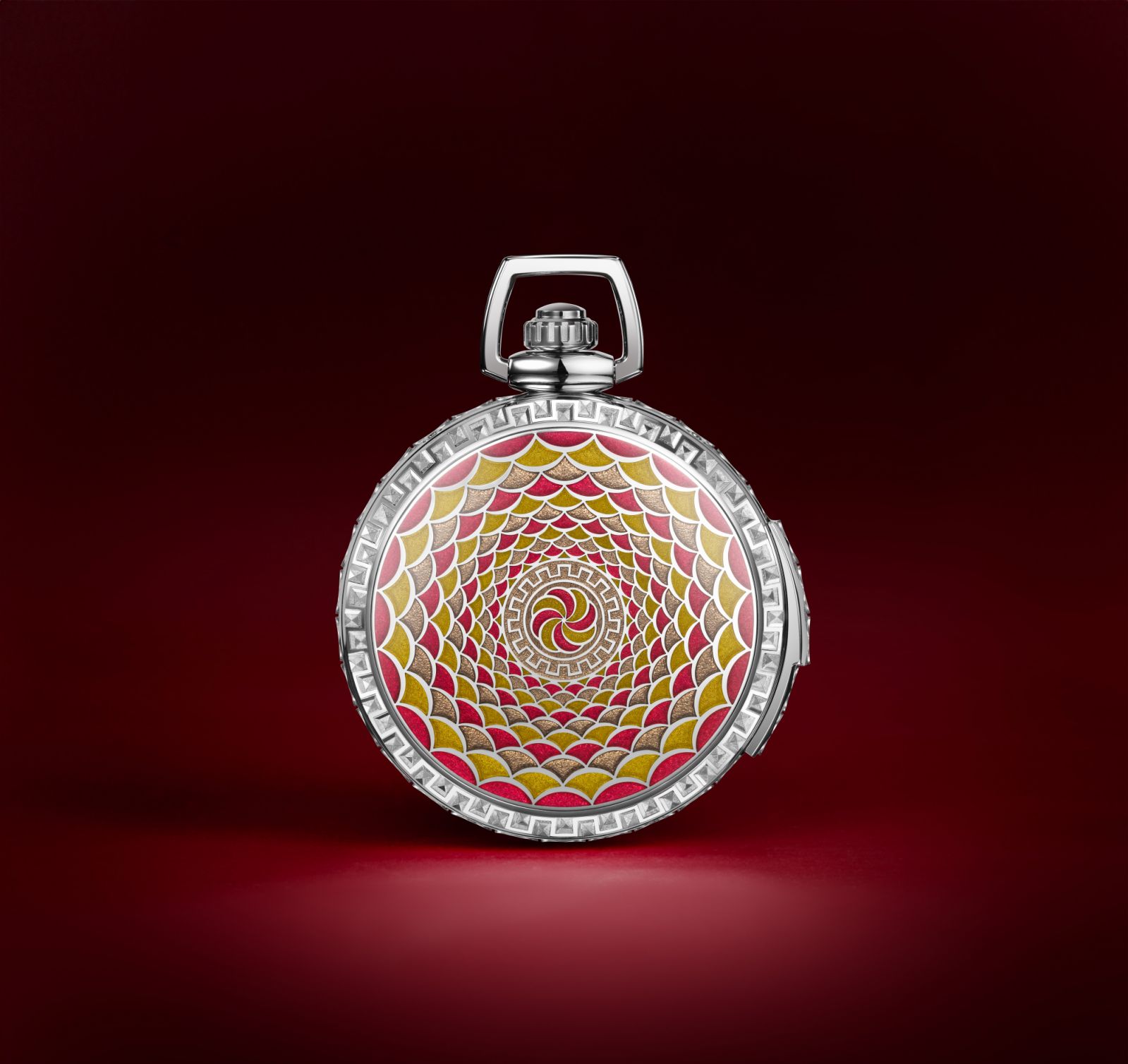 The decorative caseback is a combination of expert engraving and enamelling