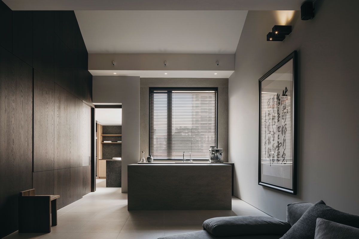 Stone and timber create a calming tableau in the kitchen