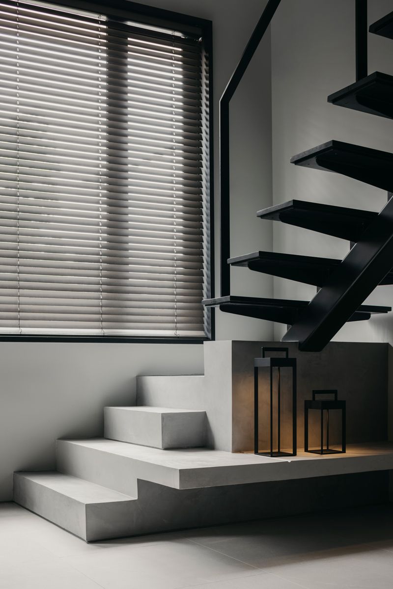 The fishbone stairs lend a graphic touch