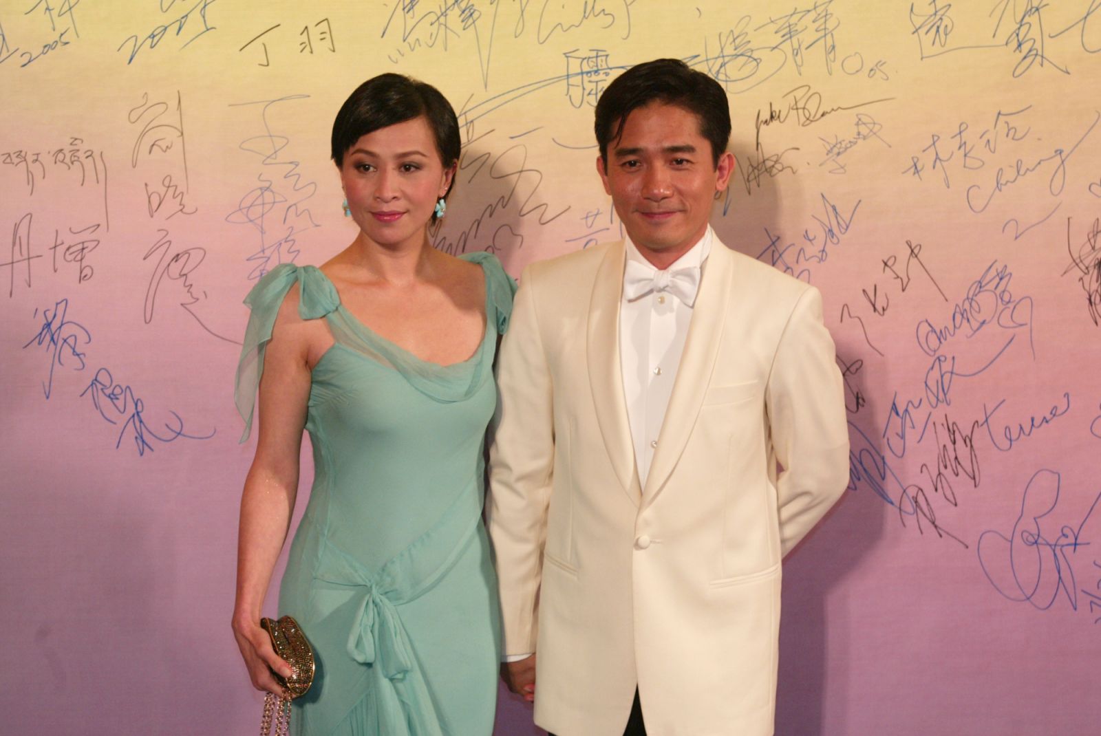 Actor Tony Leung Chiu-wai and actress Carina Lau Ka-ling at the Hong Kong Film Awards Presentation Ceremony, Hong Kong Coliseum. 27 March 2005 (Photo by Martin Chan/South China Morning Post via Getty Images)