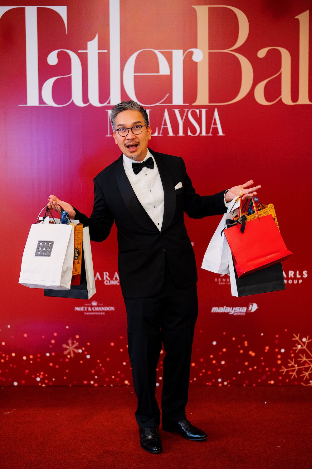 Gregory Ling with his and his wife's Rituals gift bag at Tatler Ball 2023 (Photo: All is Amazing)