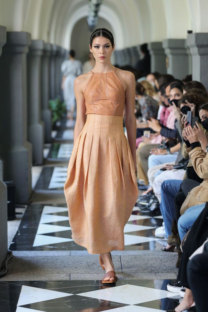 MEXICO CITY, MEXICO - OCTOBER 11: A model walks the runway during the Francisco Cancino show as part of the second day of Mercedez-Benz Fashion Week Mexico 2021 at Four Seasons Hotel on October 11, 2021 in Mexico City, Mexico. (Photo by Victor Chavez/Getty Images)
