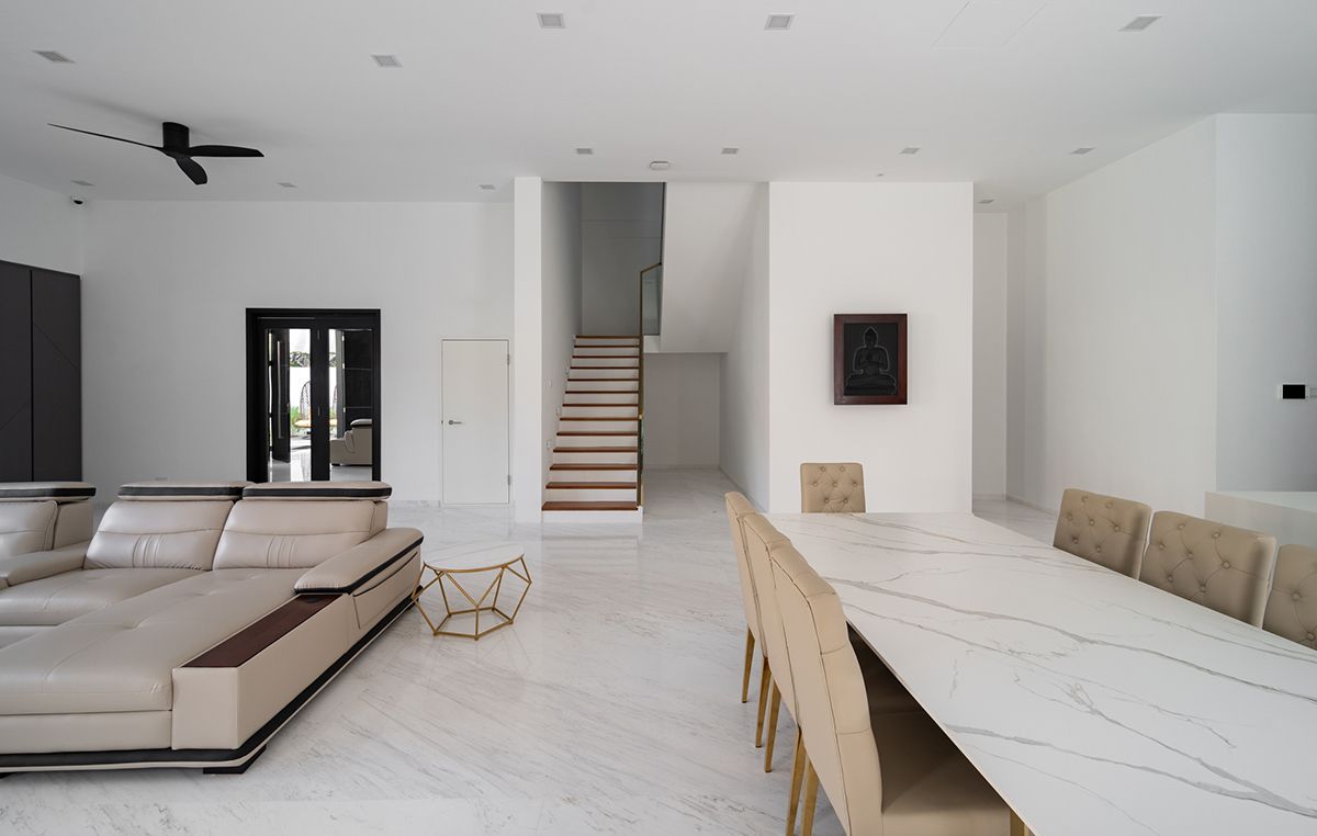 Refined interiors clad in a curated material palette