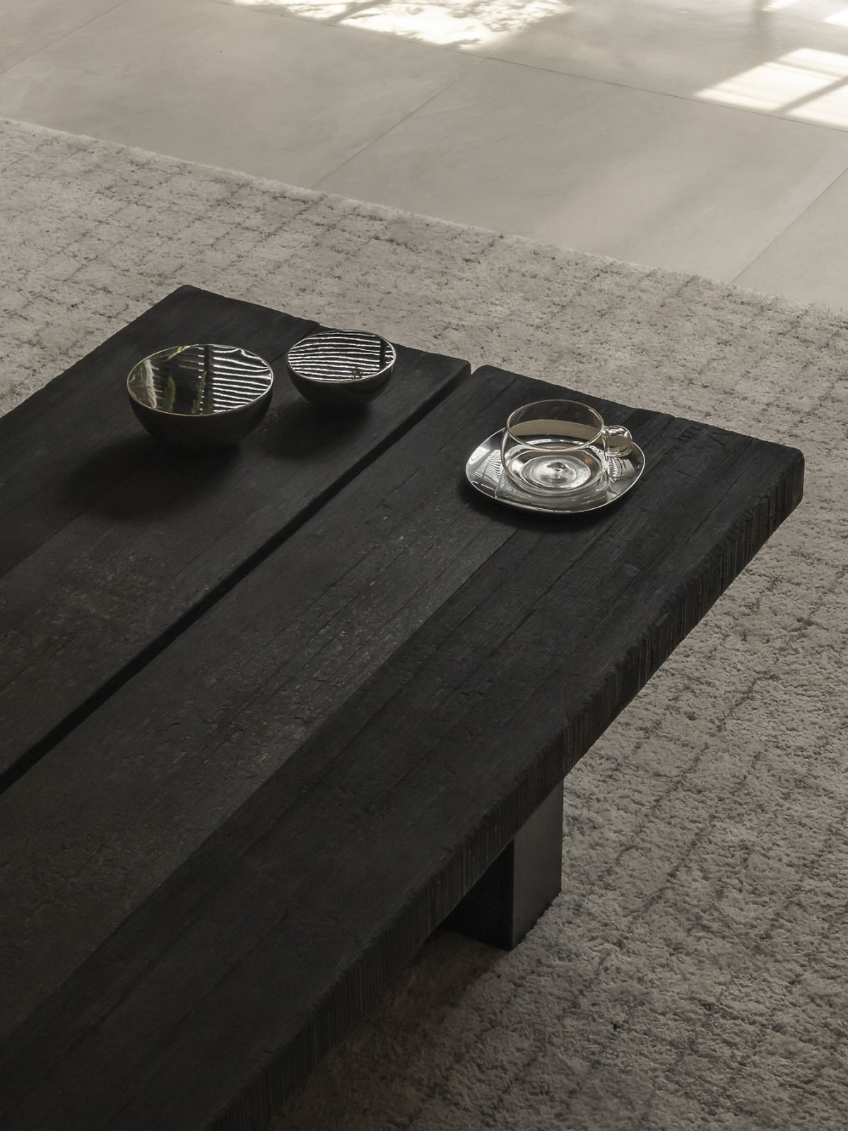The burnt nyatoh coffee table in the living area (Photo: David Yeow)