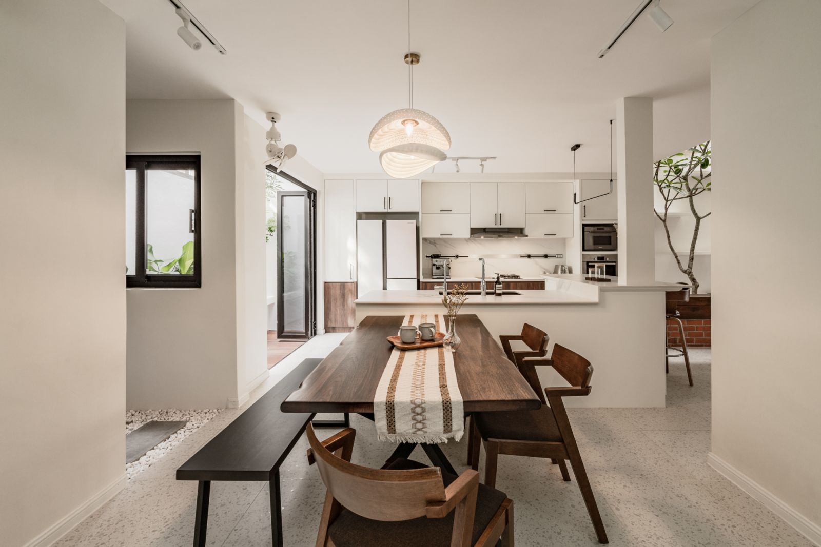 The bench and table is a gathering space