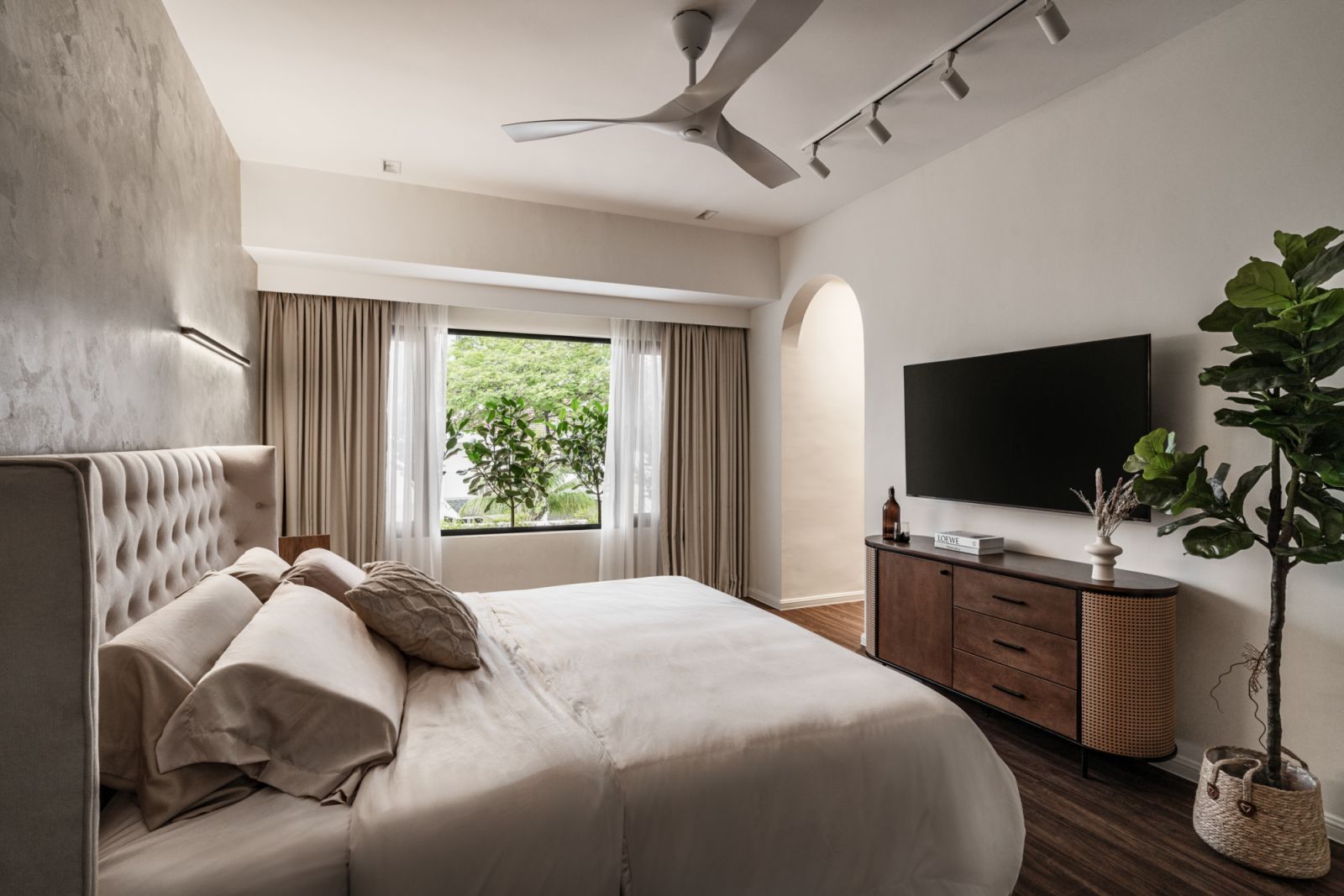 The bedroom overlooks green