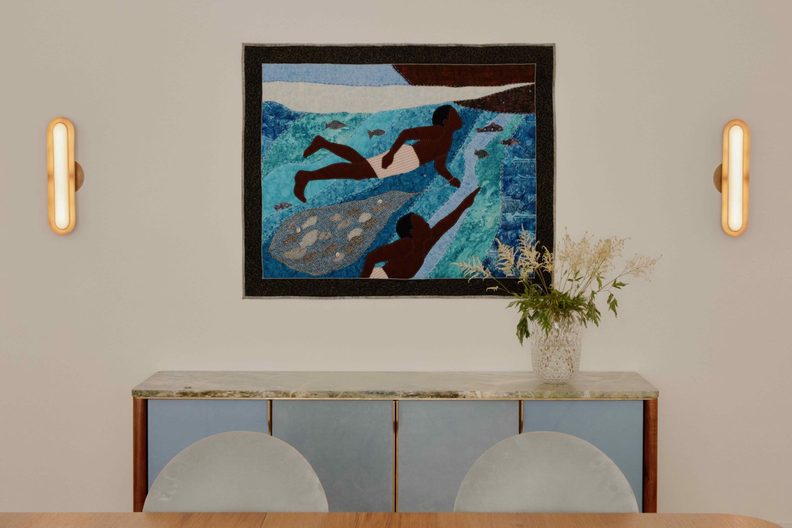 The credenza with powder blue doors matched the quilt by Stephen Towns from De Buck Gallery