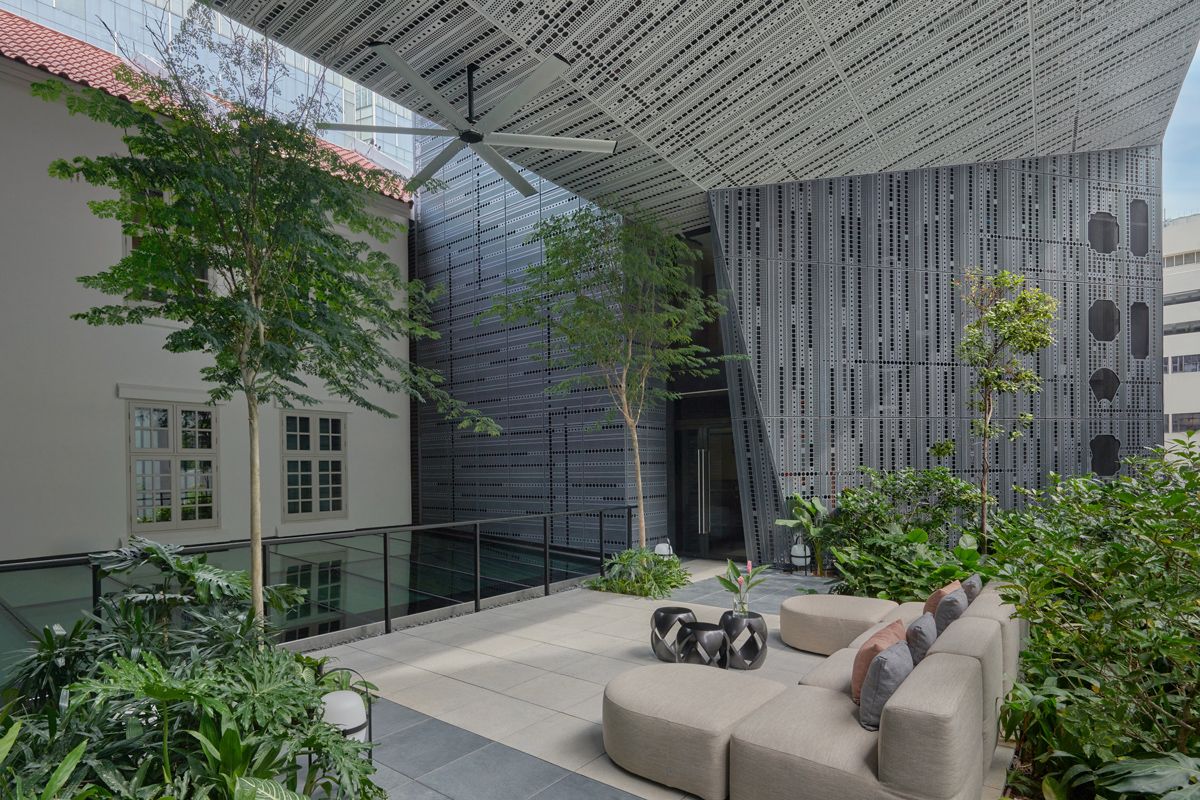 The garden terrace overlooks the glass-roofed lobby