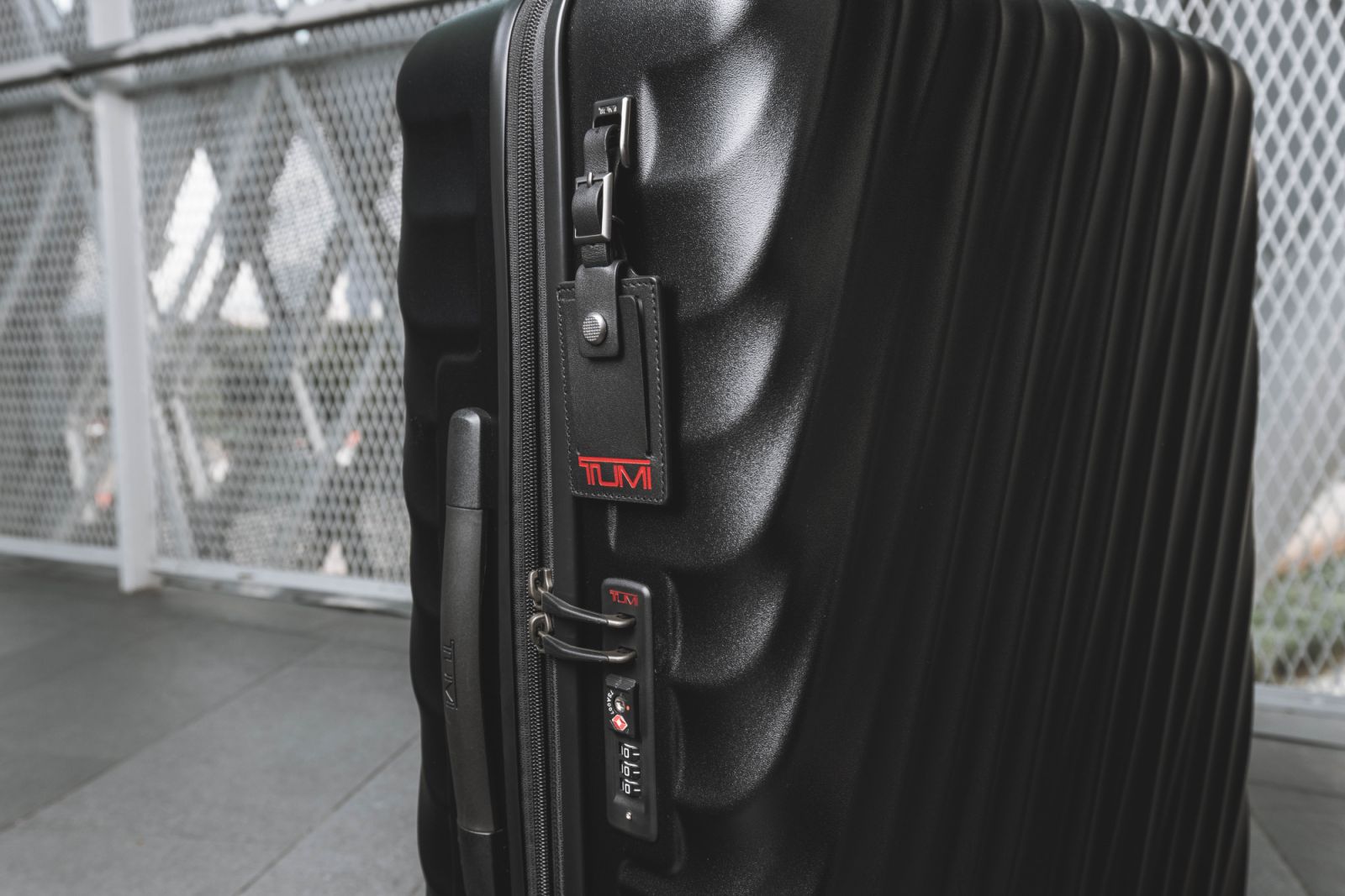 Two TSA integrated combination locks with push button to open