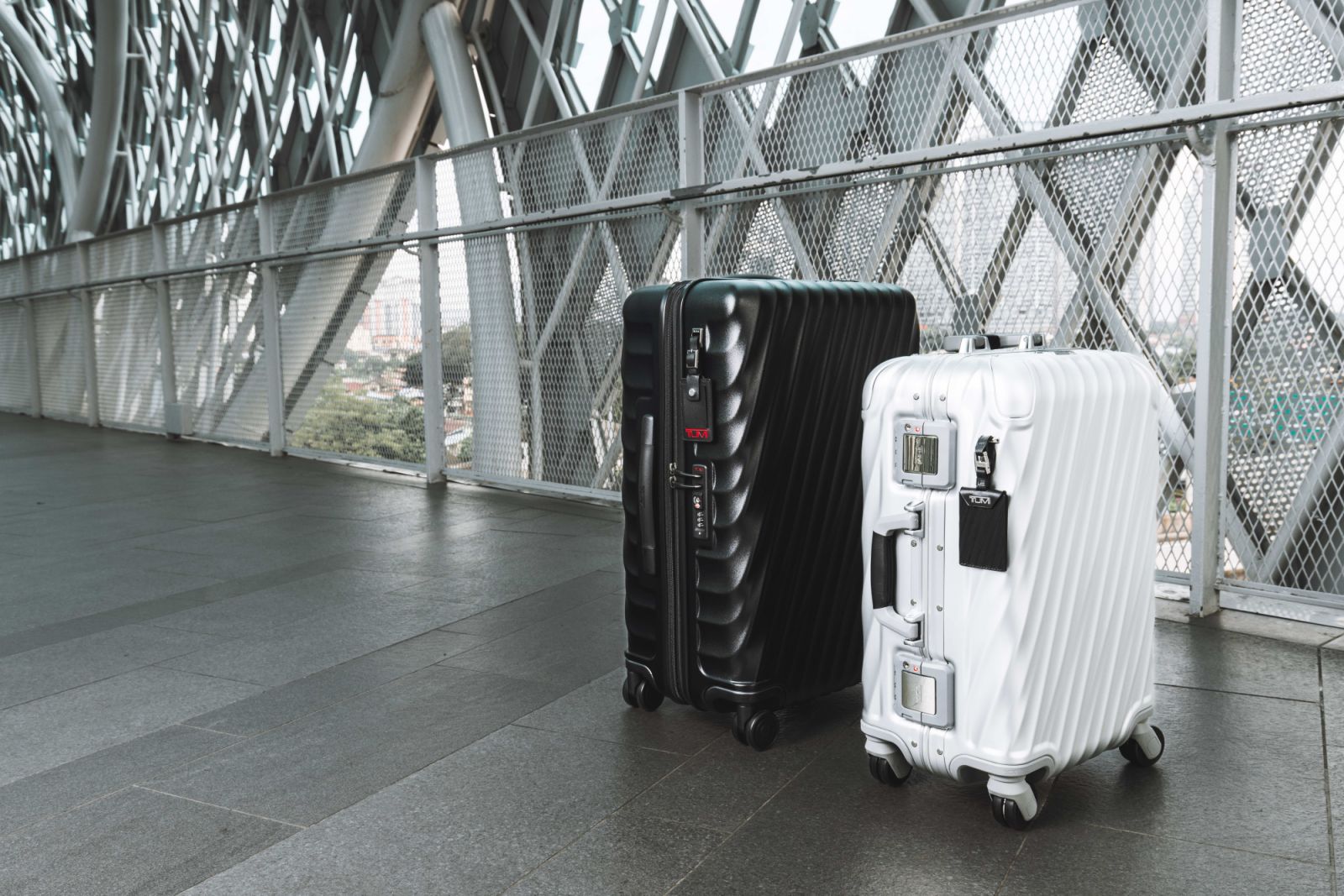 Tumi’s 19 Degree Short Trip Packing Case in Black Texture made in Polycarbonate and 19 Degree Aluminum Carry-on in Silver
