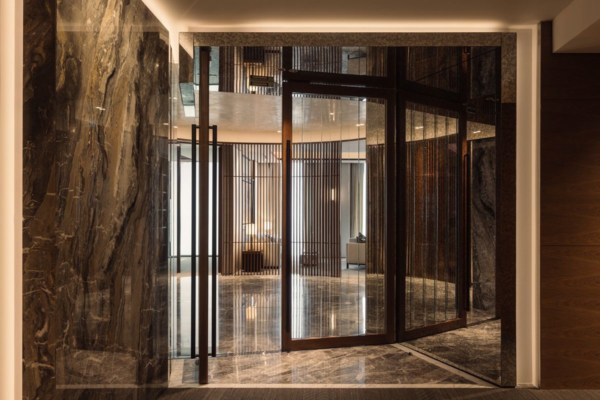 Glass, marble and wood together create a sumptuous material palette