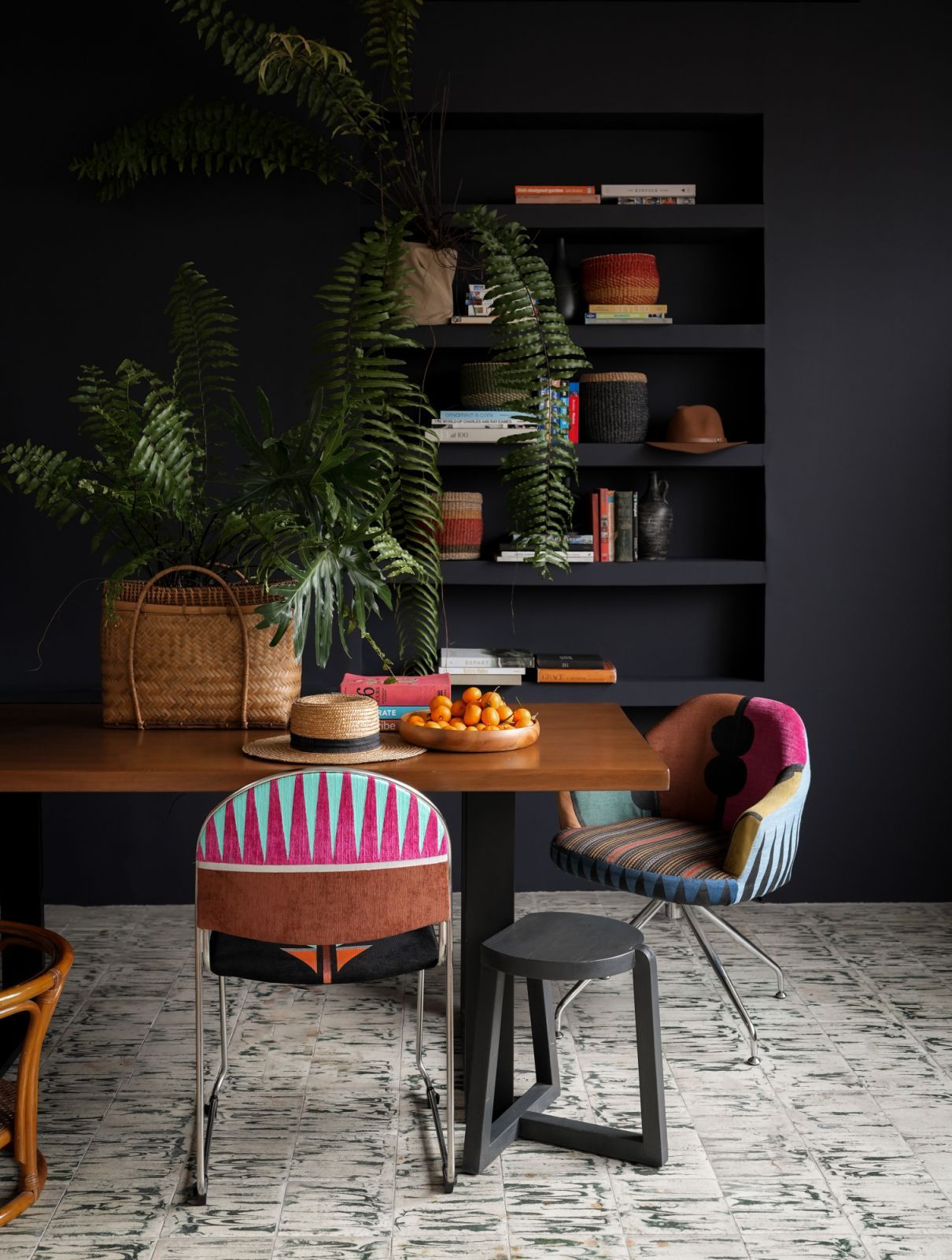Bunag has always been comfortable with high-contrast compositions; mixing dark and light, old and new, pastels and neons, synthetic and organic, as shown in this corner of her home (Photo: Kitty Bunag)