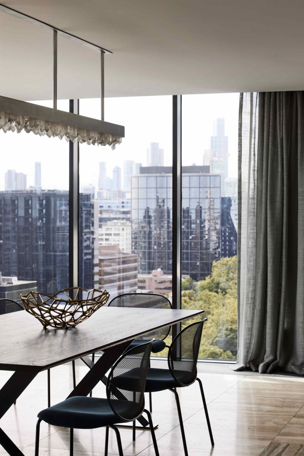 Natural glamour from the designer pendant light with illuminated clear quartz