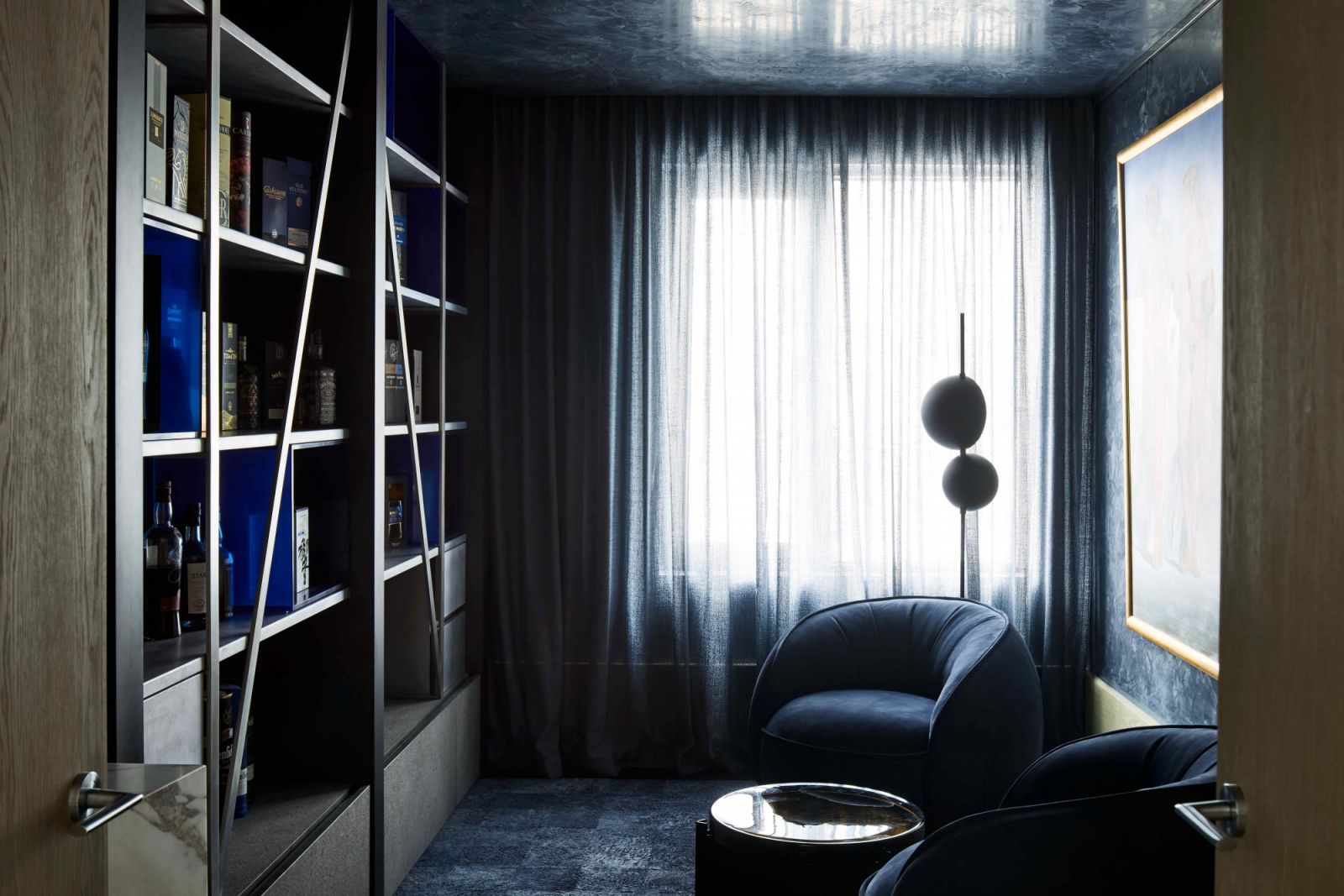 A nocturnal quarter at the blue-hued Whiskey Room