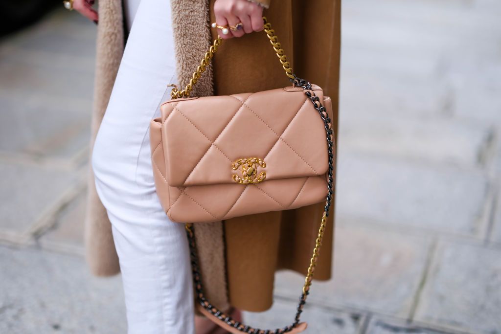 PARIS, FRANCE - DECEMBER 15: Alba Garavito Torre wears a beige Chanel 19 bag, during a street style fashion photo session, on December 15, 2023 in Paris, France. (Photo by Edward Berthelot/Getty Images)