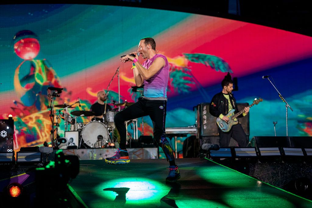 COPENHAGEN, DENMARK - JULY 5: (EDITORIAL USE ONLY) Chris Martin, Guy Berryman and Will Champion of Coldplay perform live on stage at Parken Stadium on July 5, 2023 in Copenhagen, Denmark. (Photo by Ole Jensen/Getty Images)