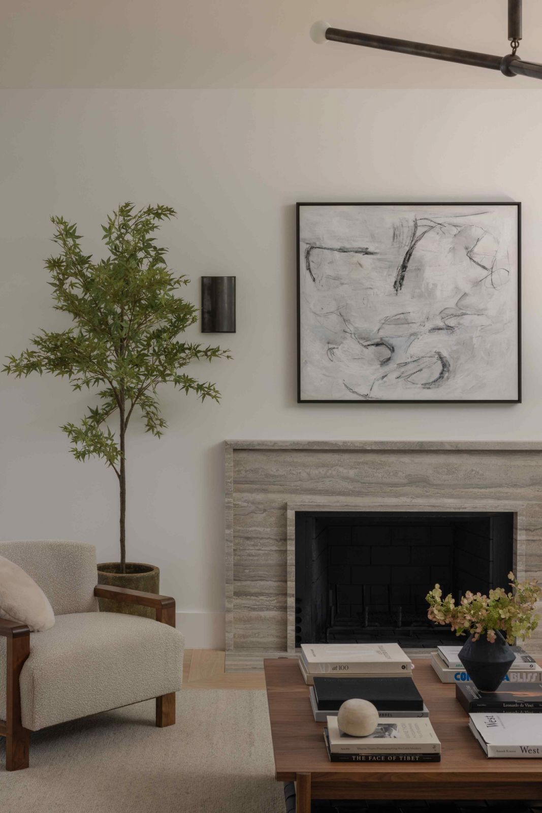 A sense of movement from the custom fireplace in the palette-restrained living room