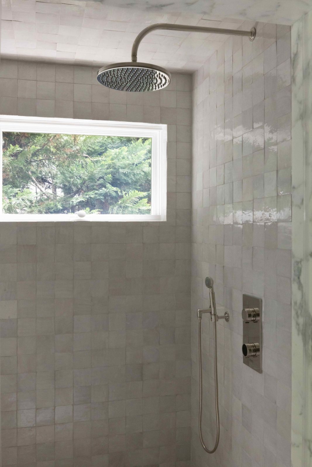 The tiles counterbalanced the modern elements of the space
