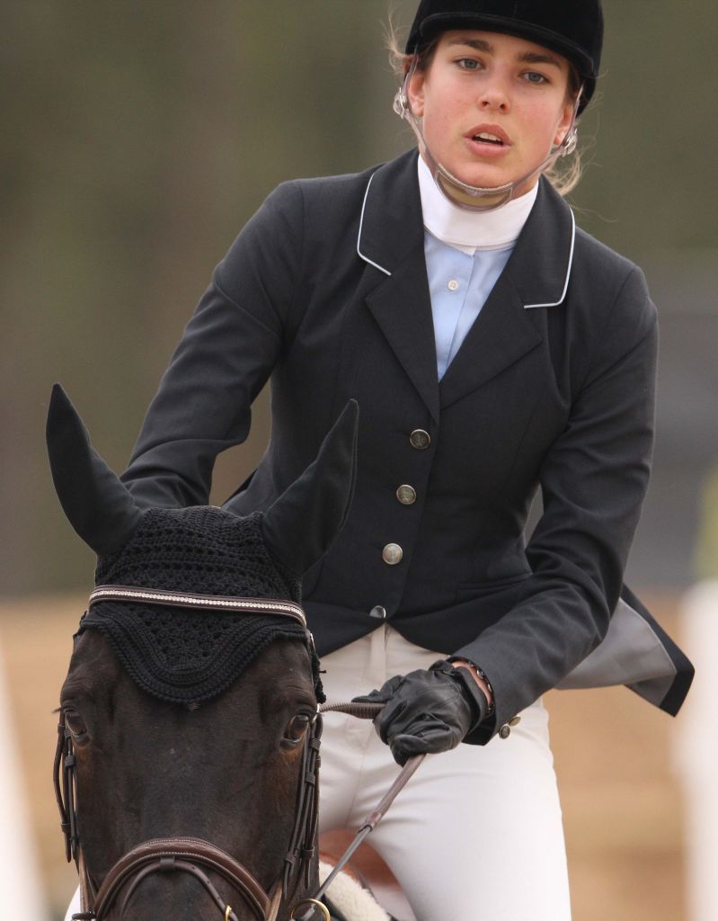 FRANCE - APRIL 06: Charlotte Casiraghi enters first horse show since 4 years with her new horse GE-JOE at the International Jumping in Barbizon, France on April 06, 2009 - Charlotte Casiraghi. (Photo by Pool BENAINOUS/SANCHEZ/Gamma-Rapho via Getty Images)