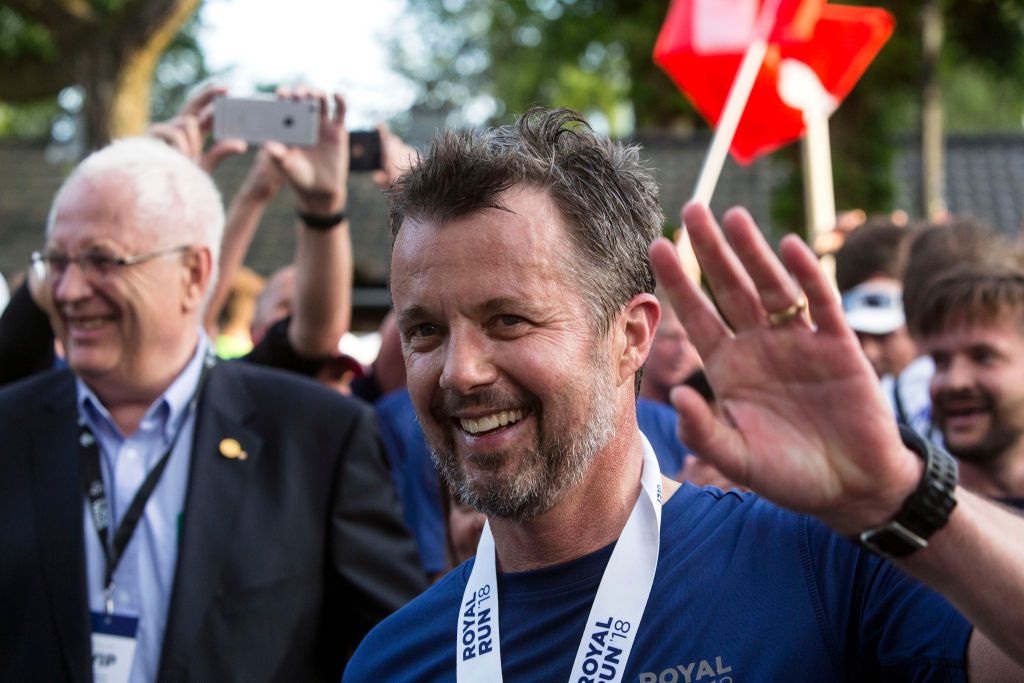 COPENHAGEN, DENMARK - MAY 21: Crown Prince Frederik of Denmark waves after finishning the Royal Run on May 21, 2018 in Copenhagen, Denmark. The Royal Run took place in the cities of Aalborg, Aarhus, Esbjerg, Odense and Copenhagen with around 70,000 participants and is part of the 50th birthday celebration for the Crown Prince. (Photo by Ole Jensen/Getty Images)