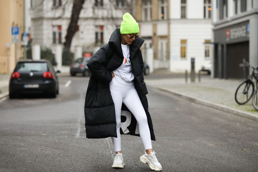 BERLIN, GERMANY - JANUARY 07: Anna Schürrle wearing Vogue sweater, Balenciaga Triple S, Acne Studios hat, Lululemon leggings, Sunday somewhere sunglasses and Barbara Bui coat on January 07, 2020 in Berlin, Germany. (Photo by Jeremy Moeller/Getty Images)