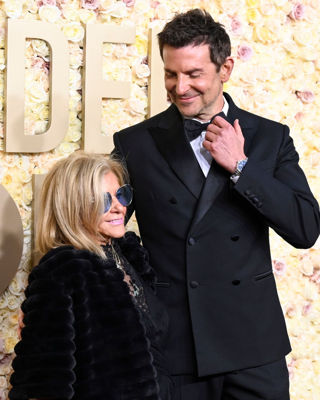 Gloria Campano and Bradley Cooper at the 81st Golden Globe Awards held at the Beverly Hilton Hotel on January 7, 2024 in Beverly Hills, California. (Photo by Gilbert Flores/Golden Globes 2024/Golden Globes 2024 via Getty Images)