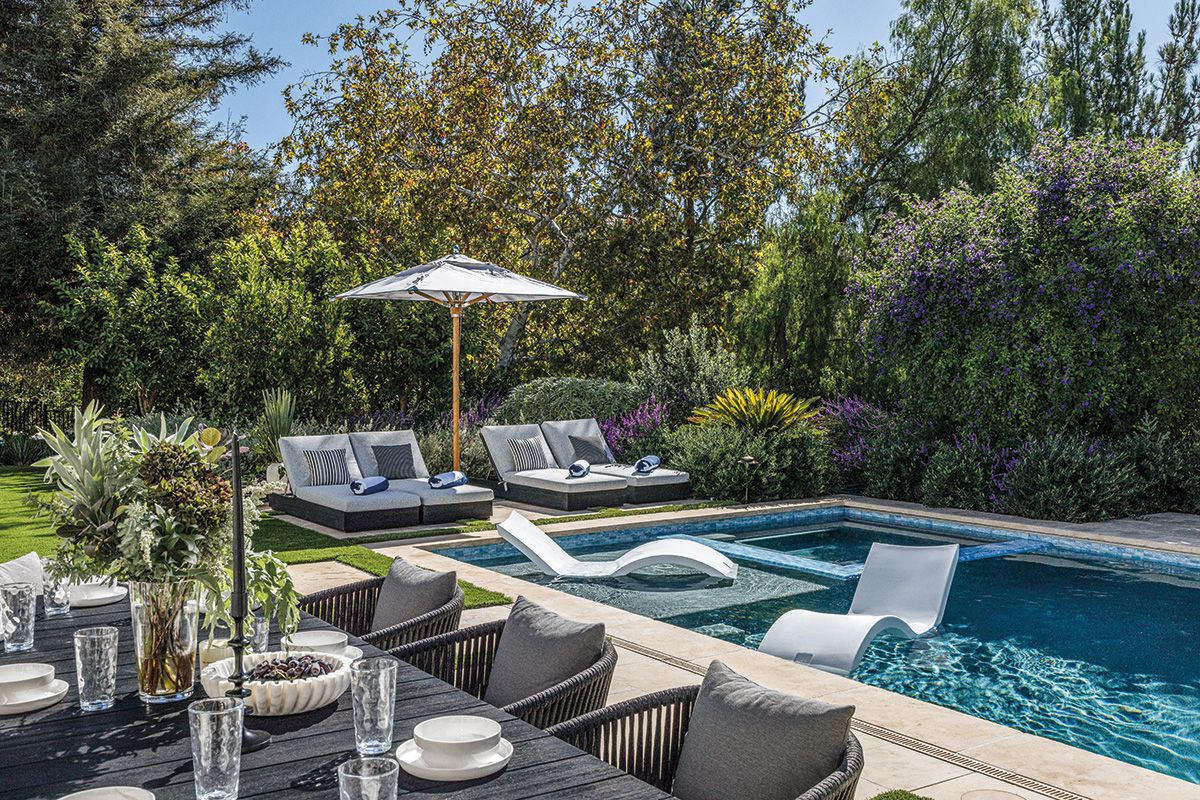 Furnished with a full dining set and relaxing sunbeds, the pool area is a place to dine al fresco or to spend the day basking in the sun