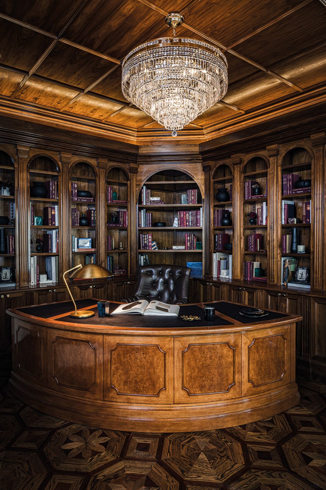 The joinery and custom furnishings in the study are crafted in the style of a grand library