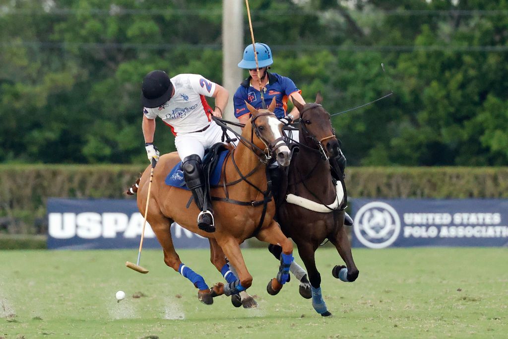馬球運動促使了積家開發出首款Reverso翻轉系列腕錶，也成了世界上最早專為運動員而開發的運動錶。(Photo by Joel Auerbach/Getty Images)